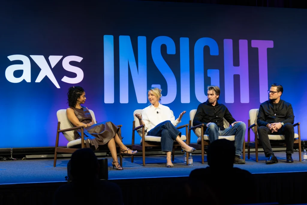 Panelists at the AXS Insight conference.